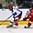 GRAND FORKS, NORTH DAKOTA - APRIL 16: Russia's Pavel Dyomin #8 skates with the puck while Switzerland's Philipp Kurashev #23 defends during preliminary round action at the 2016 IIHF Ice Hockey U18 World Championship. (Photo by Matt Zambonin/HHOF-IIHF Images)

